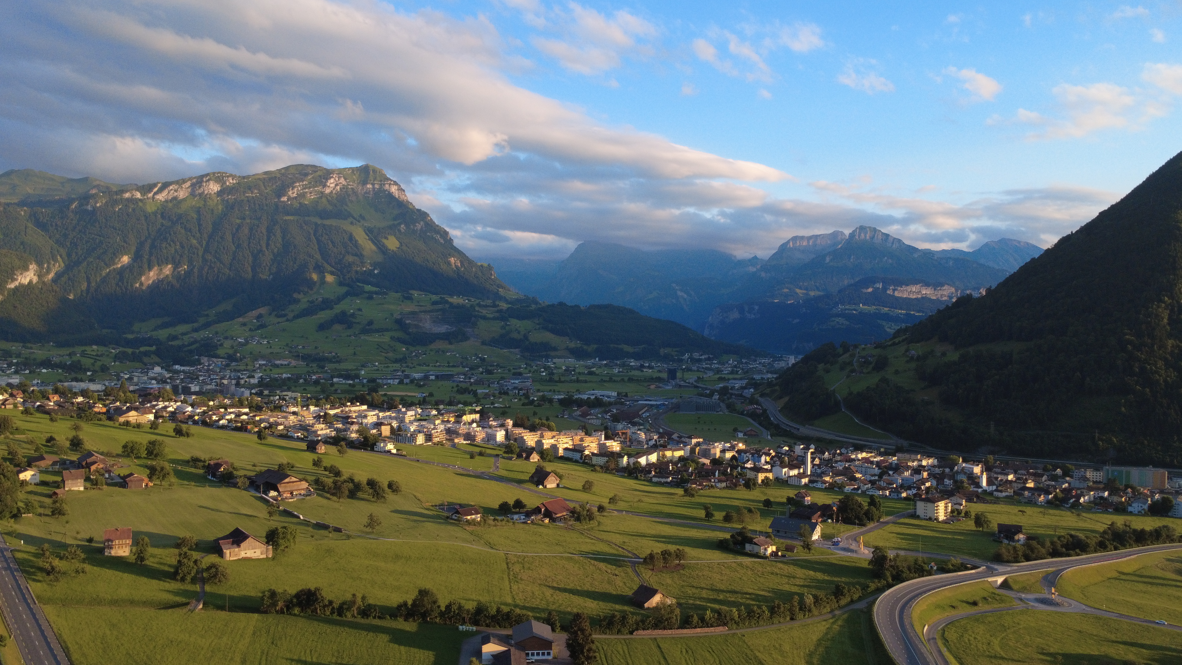 Swiss alpine hiking trail with mountain panorama